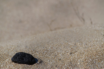 Sand texture, stone on sand