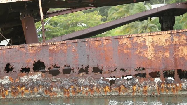 Slow motion clip of the Alexander, a shipwreck in Dixon Cove, Roatan, Honduras.