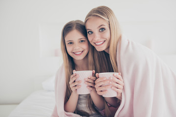 Enjoy time chat conversation lifestyle winter autumn warmth close relatives concept. Beautiful joyful excited pretty with toothy smile ladies having tea party at home covering shoulders with plaid