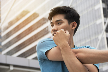 man exercise outdoor and office building background.