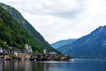 Scenic postcard view of the famous Hallstatt in the Austrian Alps in the summer morning, Salzkammergut district, Austria. View from the south
