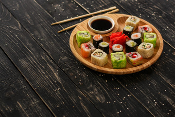 Fototapeta na wymiar sushi rolls Fresh and delicious (portion of sushi) - Sushi menu. Japanese food. food background