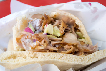 Traditional fast food dish from Kurdish street food - delicious kebab sandwich with grilled veal of...