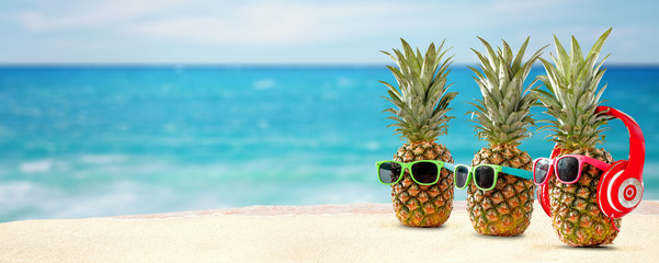 fresh pineapple on beach  - obrazy, fototapety, plakaty