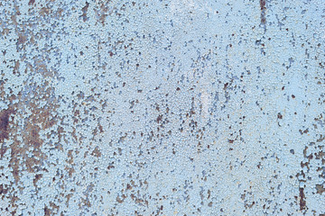 Rusty metal textured background with cracked paint. Vintage color and vintage style.