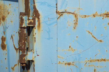 Rusty blue iron with hinge plate