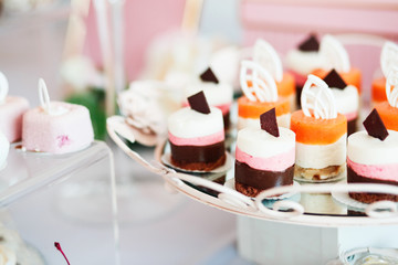 Sweet holiday buffet with cupcakes and other desserts.