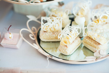 Sweet holiday buffet with cupcakes and other desserts.