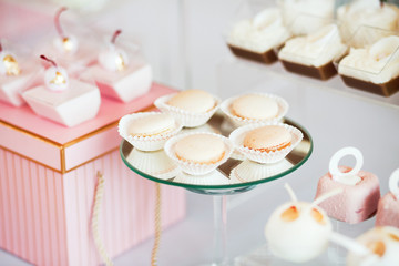 Sweet holiday buffet with cupcakes and other desserts.