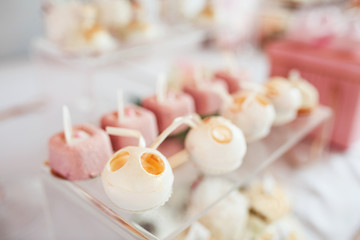 Sweet holiday buffet with cupcakes and other desserts.