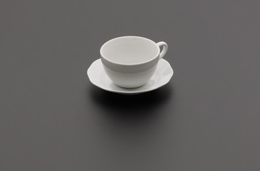 ceramic kitchen tea Cup and saucer on black background