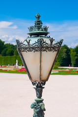 Naklejka premium Antique lantern in the park