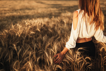 Young beautiful woman spending time in nature