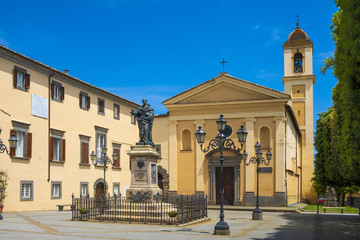 Obraz premium Bagnoregio, Italy - Annunciation Church and Saint Augustin statue in historic center of old town quarter at Piazza Sant’Agostino square