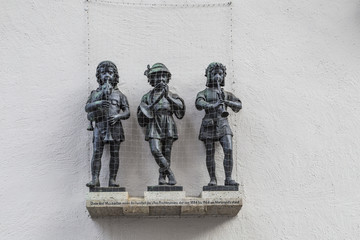 3 musicians from the former fish fountain in Munich, Germany