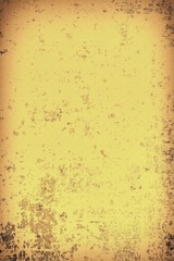 The texture of old yellow paper. Abstract grunge background