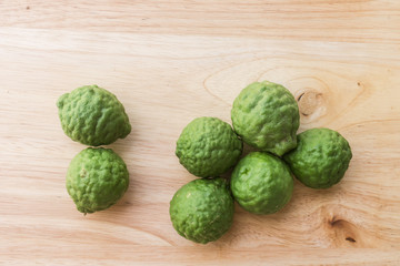 Close up of Fresh Bergamot on wood background