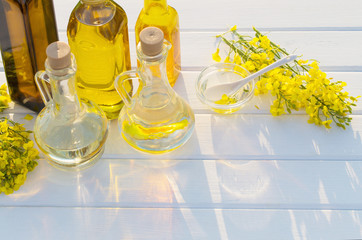 rapeseed oil on white table