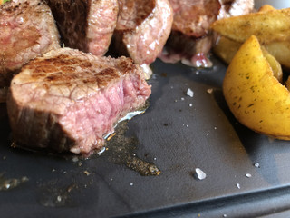 grilled veal slices with french fries