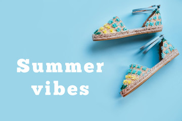 Summer fashion flatlay with gradient espadrille sandals. Perfect beach set for holidays on the sea....