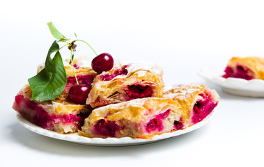 Homemade cherry sweet pie slices on a plate