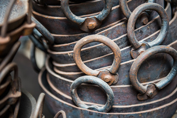 Stack of metal cooking pots for sale at Ason Tol market place.