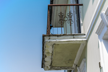 Side view at old balcony. Europe.