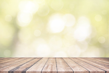 Wood table top and abstract nature blurred bokeh