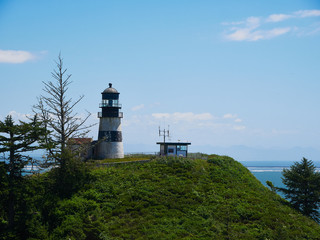 Fototapeta na wymiar Cape Disappointment Lighthouse on a sunny afternoon, Washington.