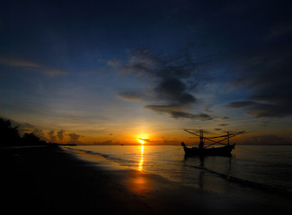 Fototapeta na wymiar Fishing boats at sunrise - Kui Buri, South Thailand 