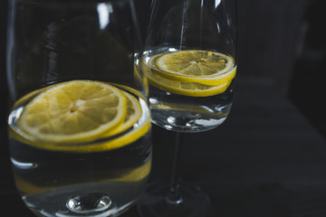 glasses of home lemonade on the black background