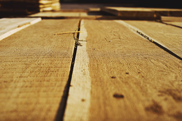 Wooden boards on a sawmill close-up