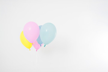 Colorful party balloons background. Isolated on white. Copy space © paulcannoby