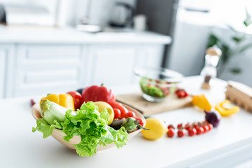 close-up view of fresh uncooked vegetables on kitchen table