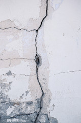 Grungy wall with large crack cement floor texture,cement large crack for background