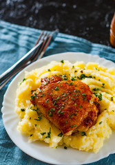 Roasted chicken breast roll stuffed with chicken and pork meat with mashed potatoes in white plate on table
