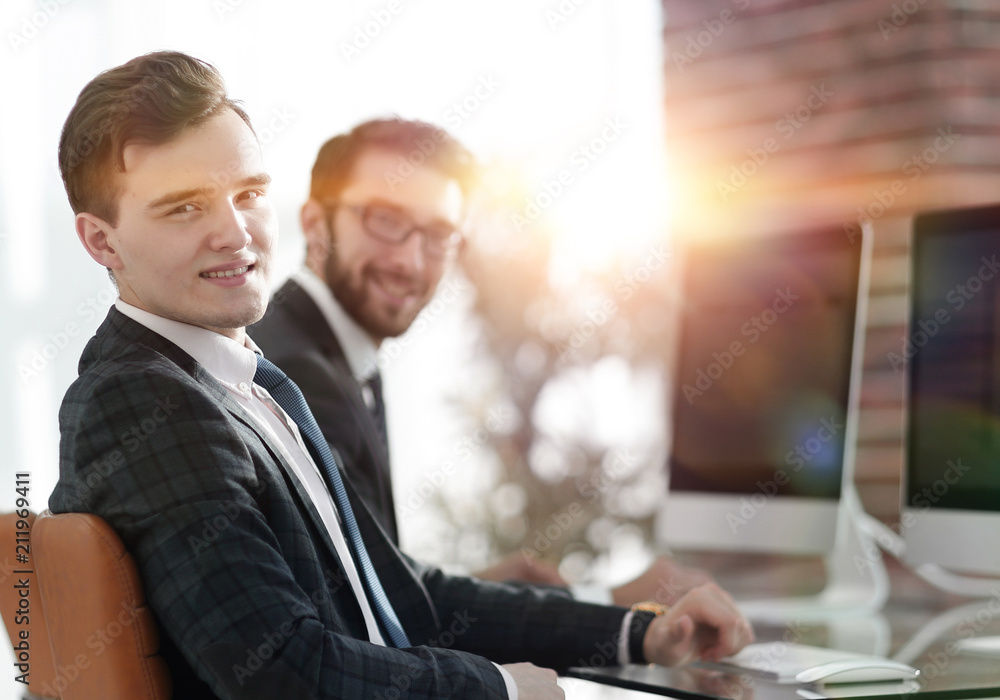 Canvas Prints young Manager at his Desk.