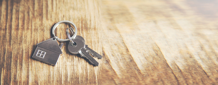 Key With House Figure On Table