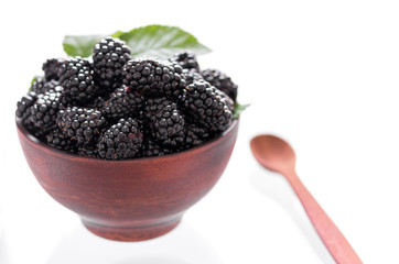 Berries and leaves of blackberry. Berries and dishes.