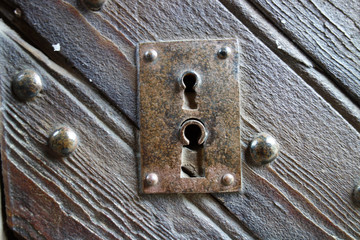 A old steel lock in a doorway entrance
