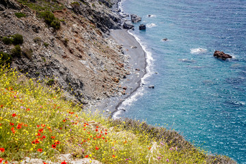 Elba's western coastline stretches out for about 35 km. From Portoferraio to Marciana Marina.  Beautiful cliffs above the sea, with a look out over the sea and around the horizon.
