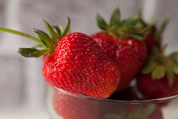 Background from freshly harvested strawberries, directly above. Healthy strawberry isolated on white background. Copy space. Top view, High resolution product.