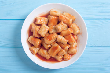 Homemade potatoes gnocchi with tomato sauce .