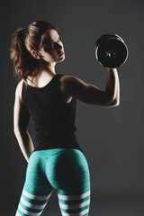 girl with dumbbells