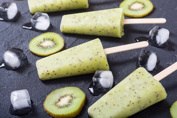 Homemade popsicle with kiwi