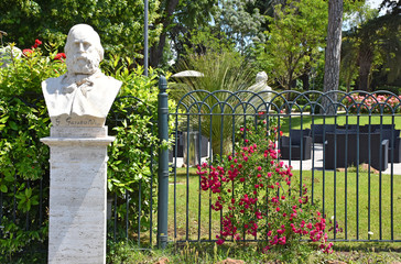 Rome,  busts and statues of historical and mythological figures in the avenues of Villa Borghese, a large public park in the center of the city.