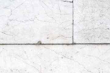 Part of white block wall.