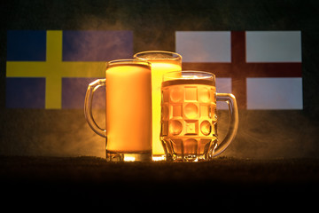 Soccer 2018. Creative concept. Beer glasses with beer on table ready to drink. Support your country with beer concept.