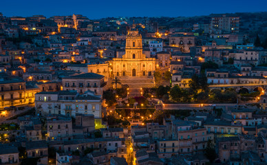 Modica at sunset, amazing city in the Province of Ragusa, in the italian region of Sicily (Sicilia). - obrazy, fototapety, plakaty