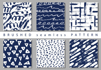 Vector Set seamless pattern with brush stripes and strokes sign. Blue color on white background. Hand painted grange texture. Ink geometric elements. Can be used for Xmas Christmas. Repeat print.